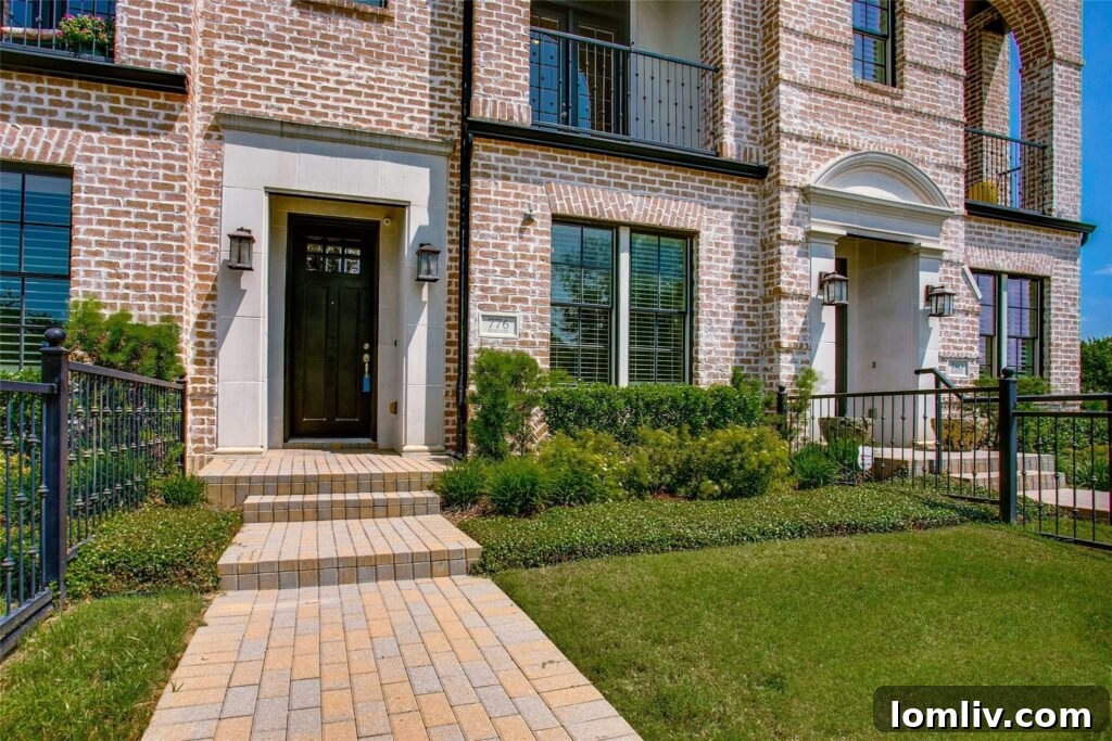 Exterior of 776 Sid Rich Drive townhome with fenced yard