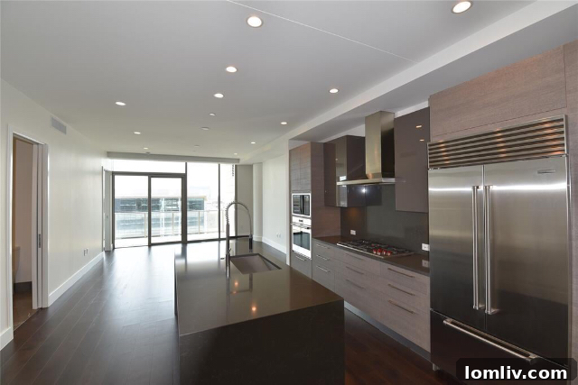 Interior view of Unit 905, a one-bedroom luxury condo at Windrose Tower