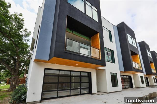 Modern Kirby Residences exterior view with sleek stucco facade in Dallas East Village