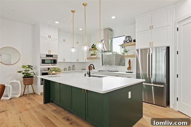 Gourmet kitchen with pristine Calacutta quartz countertops, shaker-style custom cabinetry, and Bosch appliances