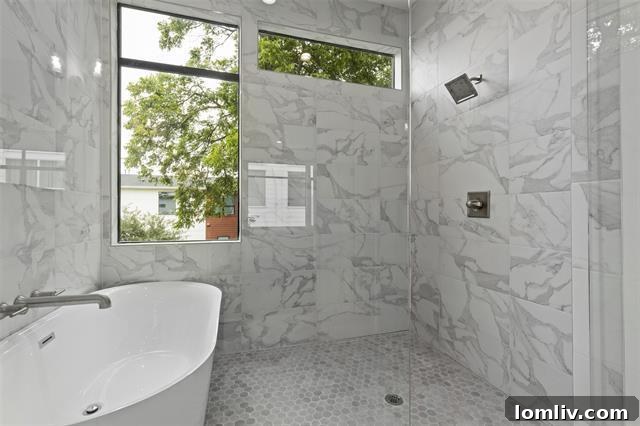 Private, fully-fenced backyard with maintenance-free artificial turf, perfect for urban living