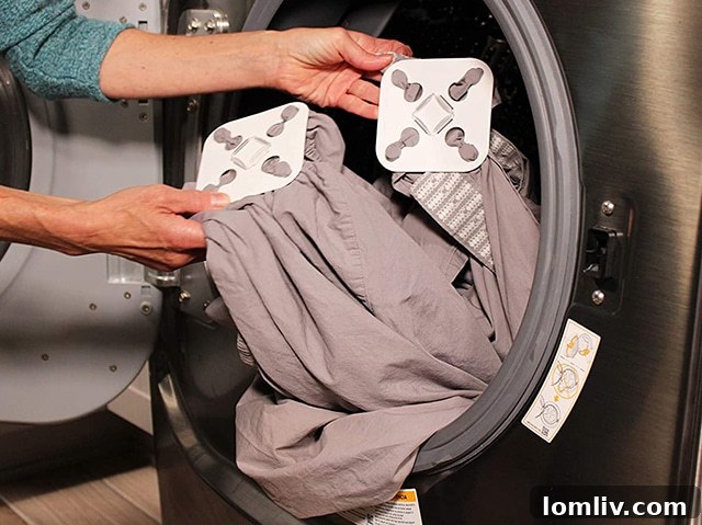Wad-Free pads attached to bed sheets inside a washing machine