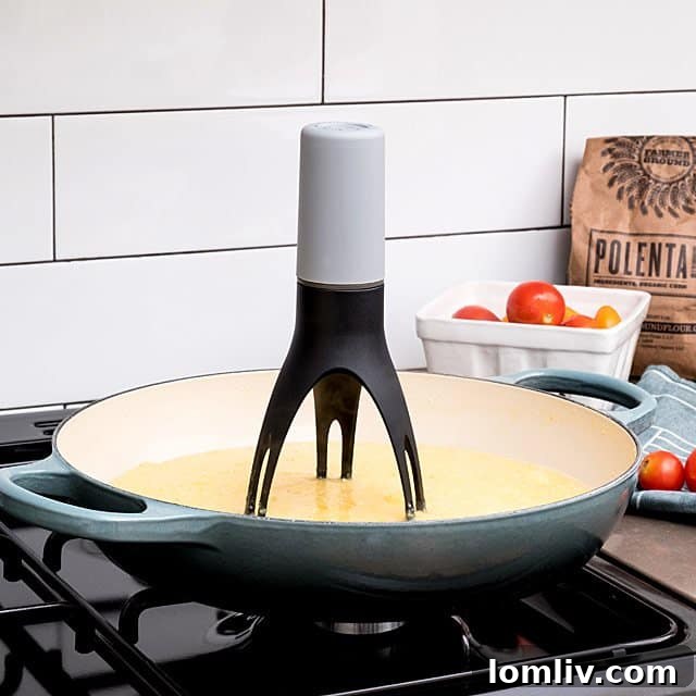 Automatic Pan Stirrer operating in a pot on a stove
