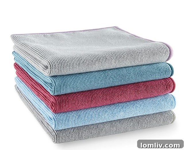 Norwex EnviroCloths, versatile microfiber cleaning cloths, with a spray bottle
