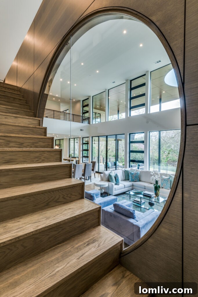 Modern Strait Lane Residence by DGA Douglas Guiling Architect, overlooking a natural creek