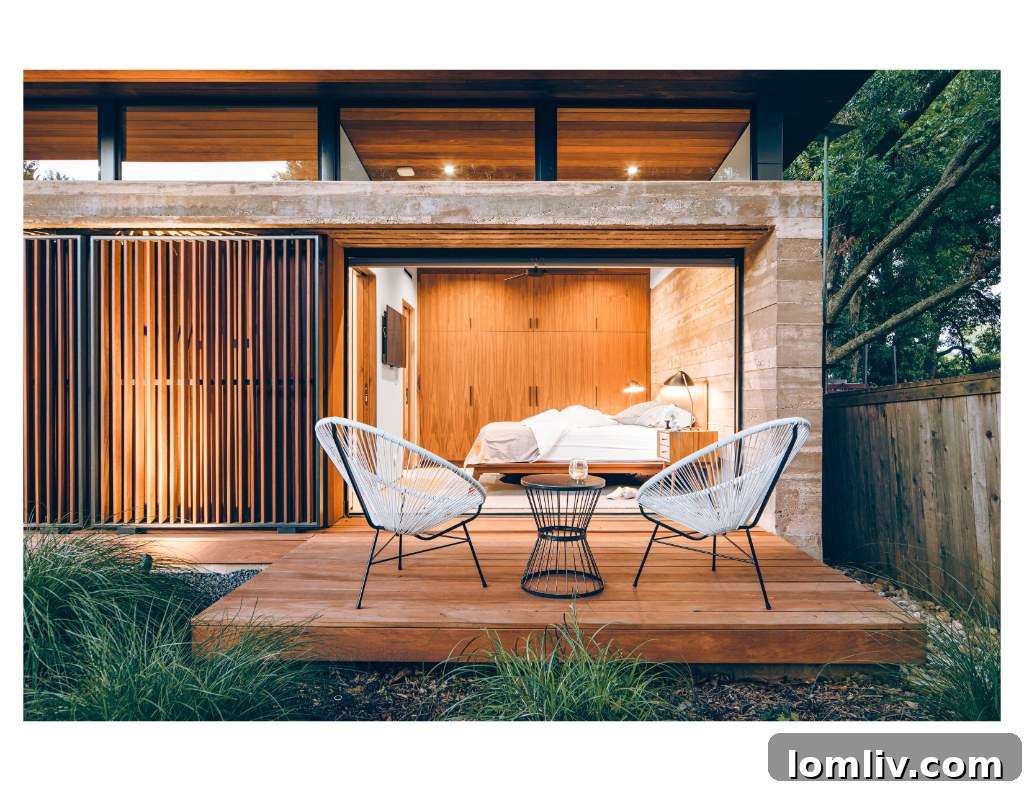 Linear pool and entertainment decks connecting Five House to the main residence