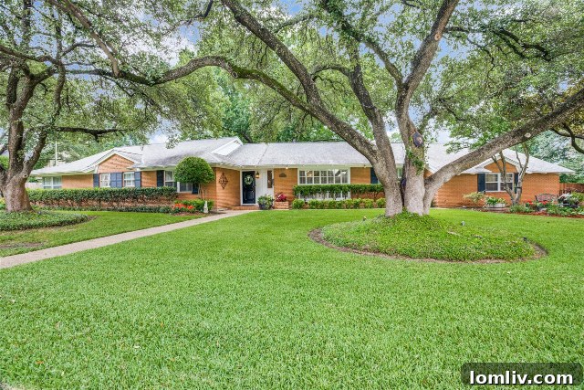 Elegant Westcliff Home Exterior with Lush Landscaping and Large Front Yard