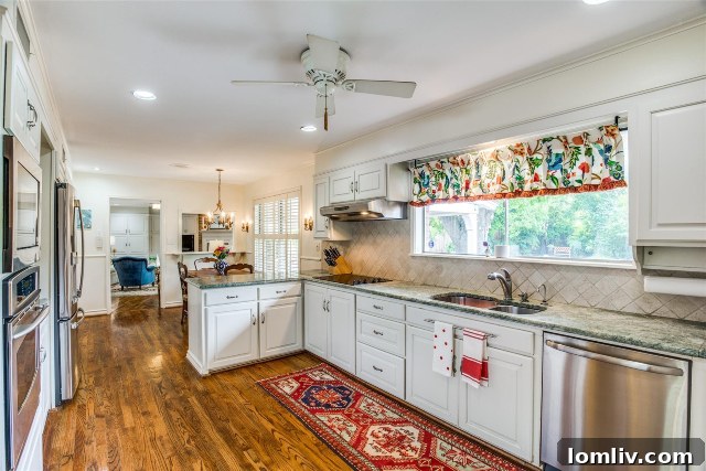 Bright and Modern Kitchen with Ample Counter Space and Central Island
