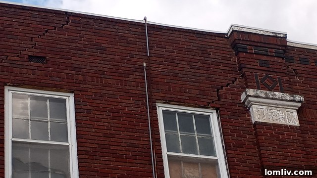 Gaps and deterioration in the brickwork of Oak Cliff United Methodist Church