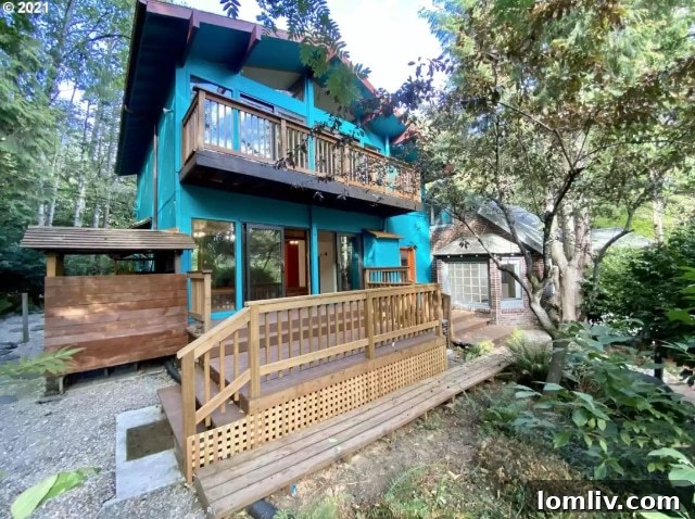 A cluttered, multi-level front porch with numerous irregular steps and mismatched materials, embodying common DIY blunders in outdoor construction.