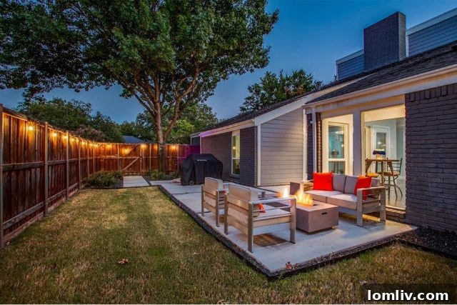 Luxurious primary bathroom with a freestanding tub and skylight shower