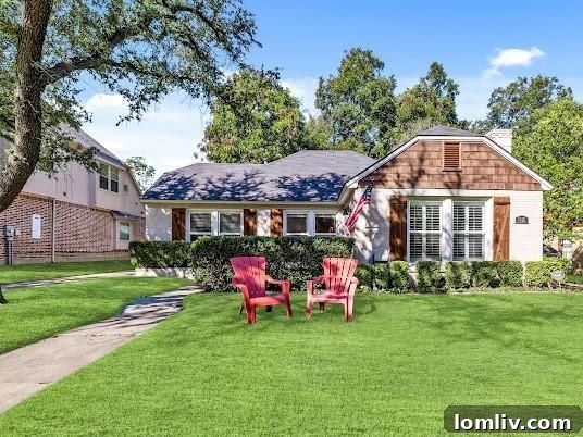 The Mockingbird Home That Captivated 1939 2 Historic Dallas home exterior, white painted brick facade of 4221 Camden Ave