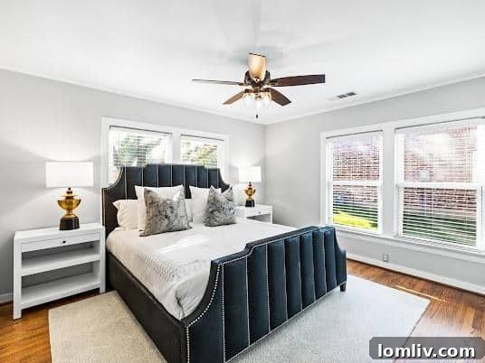 The Mockingbird Home That Captivated 1939 8 Second living room with vibrant blue built-ins and natural light