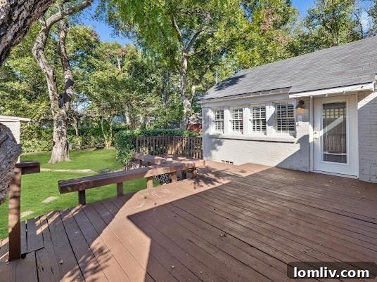 The Mockingbird Home That Captivated 1939 10 Expansive wooden deck, ideal for outdoor entertaining and relaxation