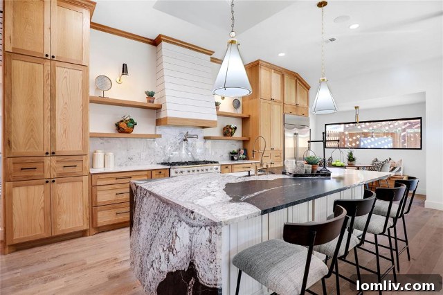 The stunning exterior of 6115 Sandydale Drive, a luxury European-style farmhouse in Prestonwood, Dallas