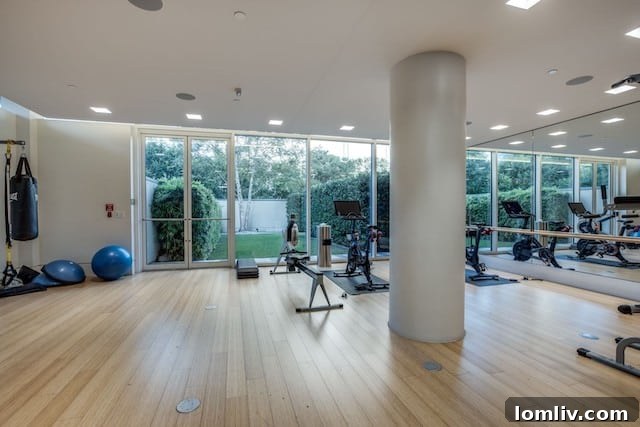 Sleek and minimalist hallway leading to a private entrance in a Museum Tower Dallas luxury residence