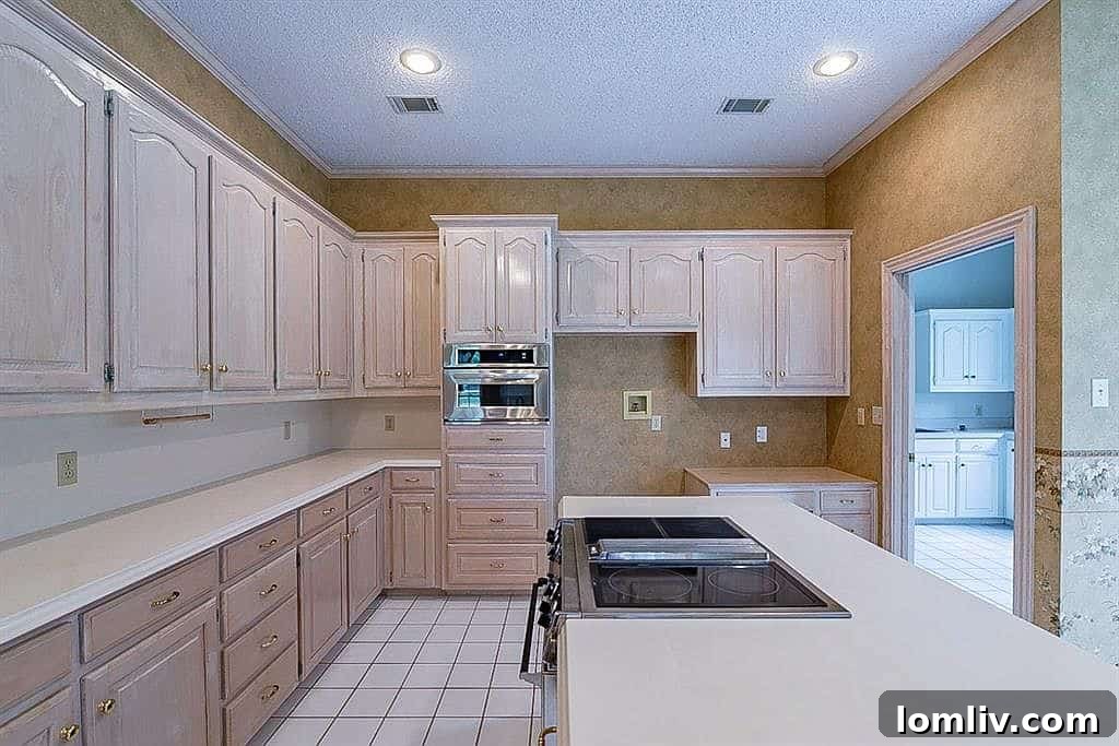 Front view showcasing the impressive porte cochere of this Stonebridge Ranch custom home