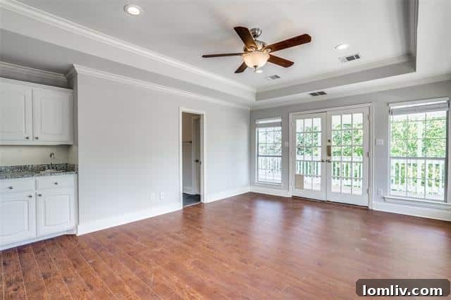 Versatile Upstairs Primary Suite or Game Room with Balcony Access