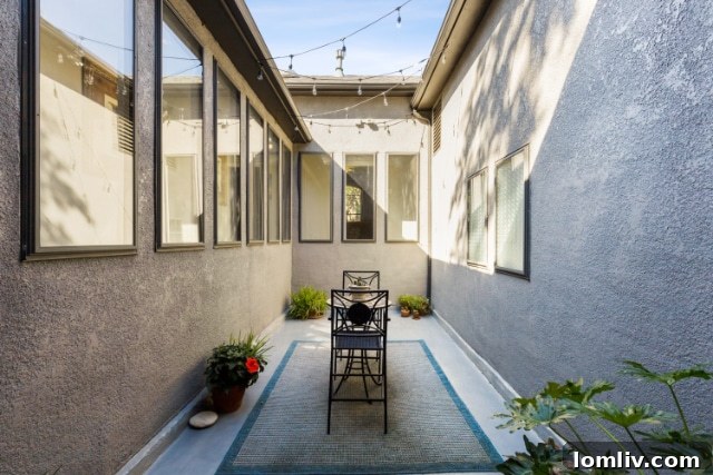 Elegant Dallas home interior, view of living space with arched windows