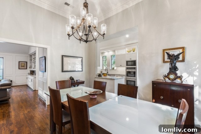 Cozy family room with striking wood-beamed ceilings and fireplace