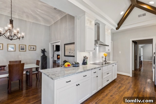 Detail of elegant wood and stone fireplace in a remodeled Dallas house