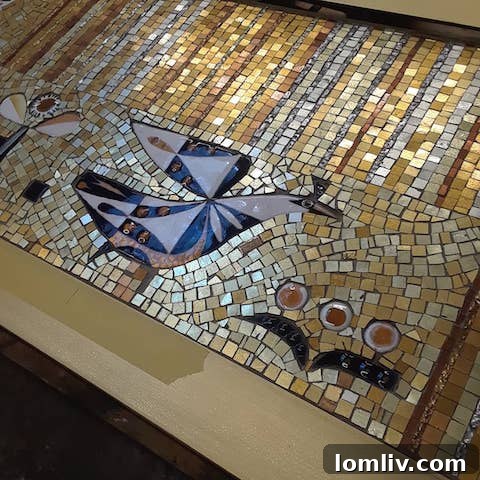 Detail of Octavio Medellín mosaic being preserved