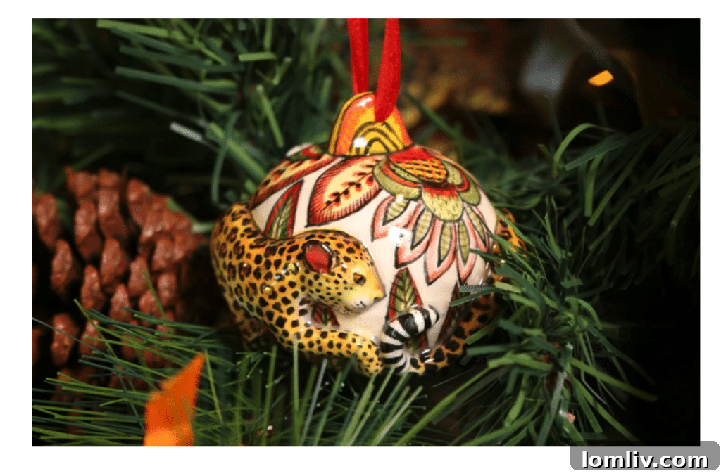 Handcrafted leopard Christmas ornament by Ardmore Design