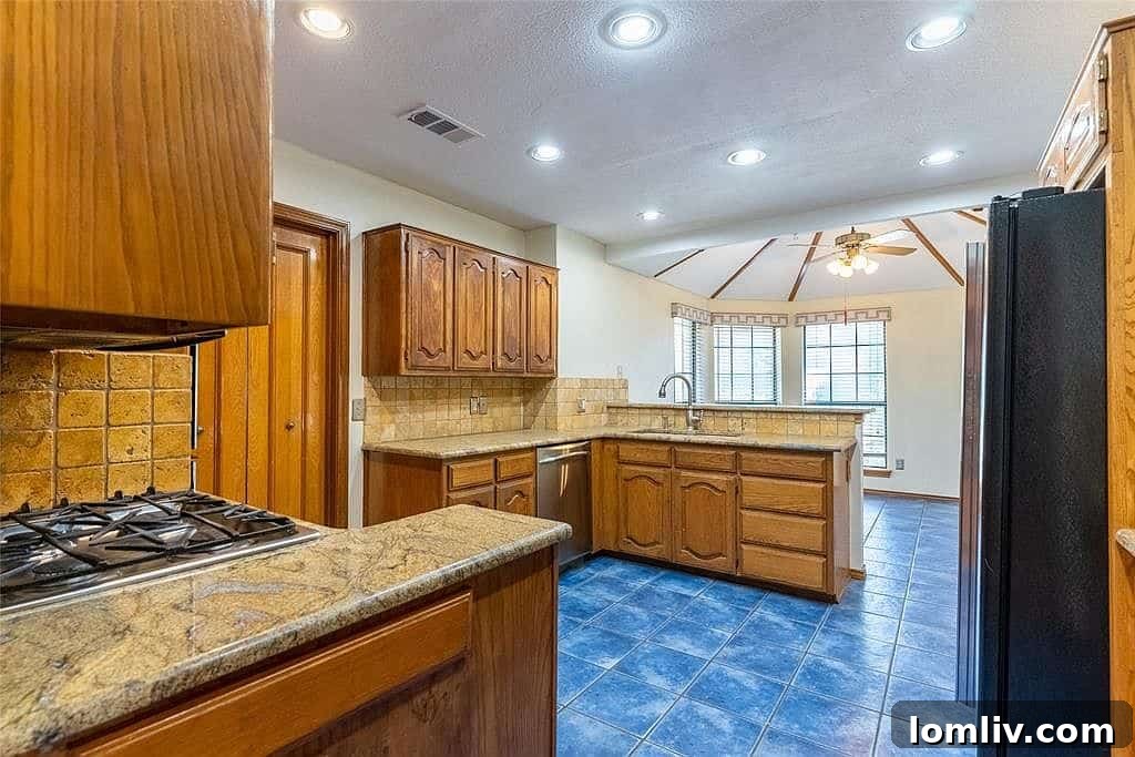 Kitchen and dining area with blue ceramic tile at 4456 Odessa Circle