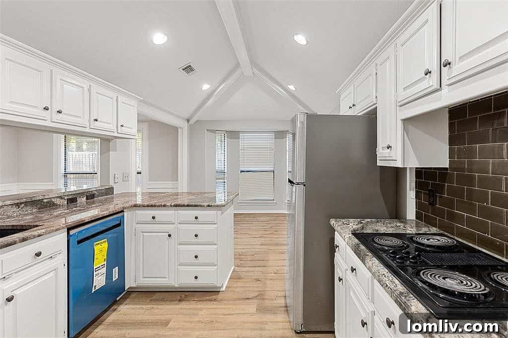 Updated white kitchen with stainless steel appliances, 1609 Eden Valley