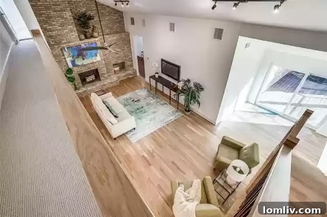 After renovation: Contemporary living area with Midcentury Modern touches