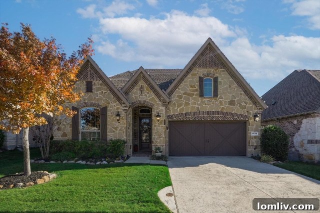 Modern patio home in Flower Mound with stone and brick elevation and inviting entrance