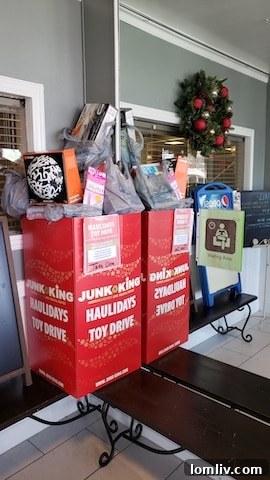 Junk King HAULidays Toy Drive: Drive Up the Joy! 4 Volunteers organizing toy donations