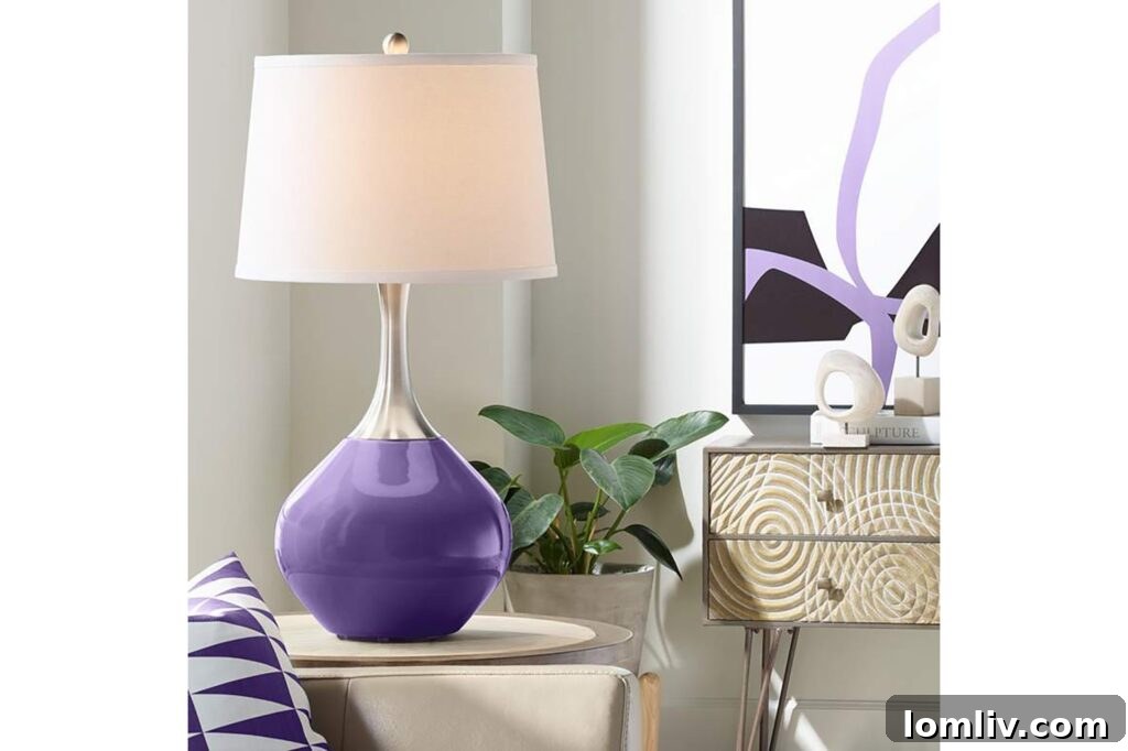 Elegant table lamp with a soft periwinkle shade, a perfect accent for bringing Very Peri into home decor