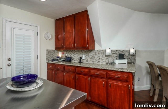 Kitchen space utilizing the low slope of the geodesic dome.