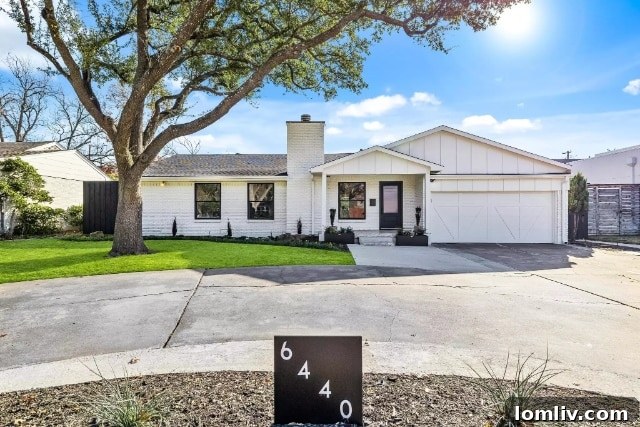 Lush green backyard ideal for a pool, offering privacy and space at 6440 Royal Lane.