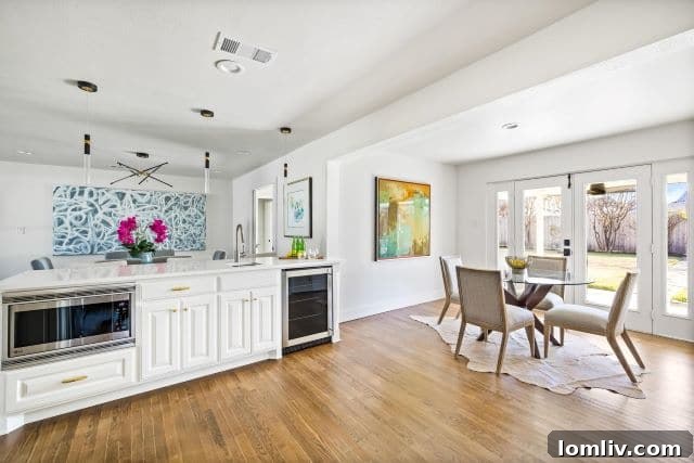 Another perspective of the gourmet kitchen, highlighting built-in appliances and custom cabinetry.