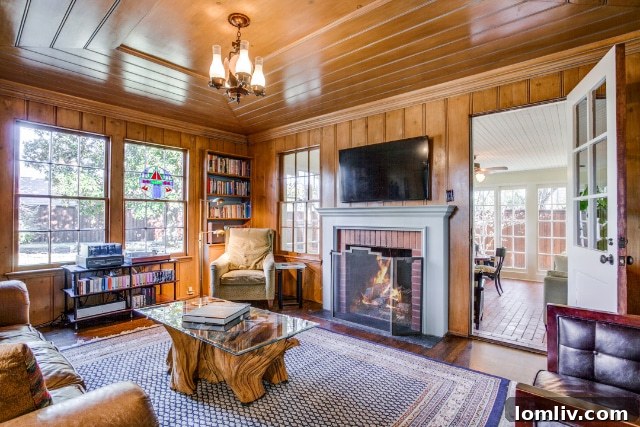 A closer look at the elegant brick flooring and abundant natural light within the charming garden room.