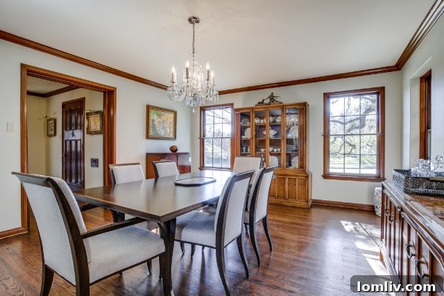 A spacious and well-lit interior common area, featuring classic architectural details and elegant furnishings.