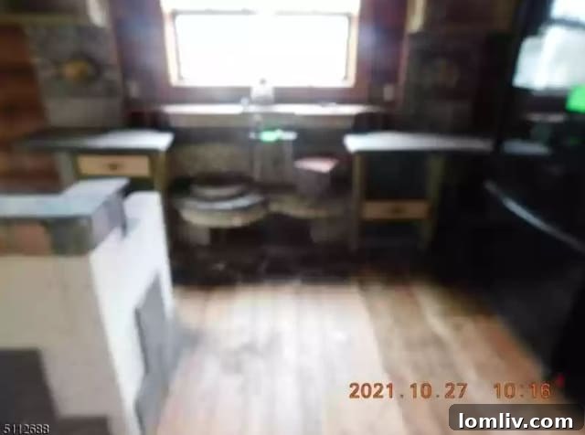 Close-up of unfinished log cabin wall with exposed wood and construction elements