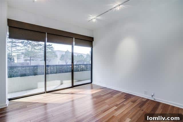 Make Your Grand Entrance: Warrington Luxury Rentals 8 Master bedroom with direct access to private balcony in Turtle Creek condo