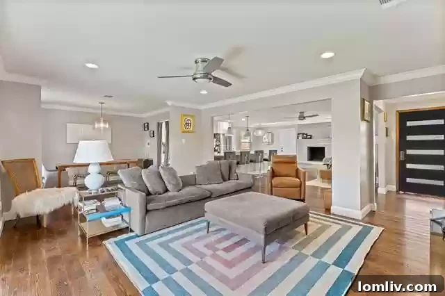 Sparkman Club Estates: Your Turnkey Home in a Welcoming Community 4 Open Concept Living and Dining Area - 10443 Royal Club Lane