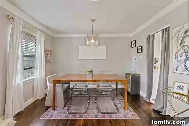 Sparkman Club Estates: Your Turnkey Home in a Welcoming Community 6 Elegant Transition from Living to Dining Area - Royal Club Lane