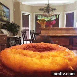 Holiday gathering around a dining table with a turkey