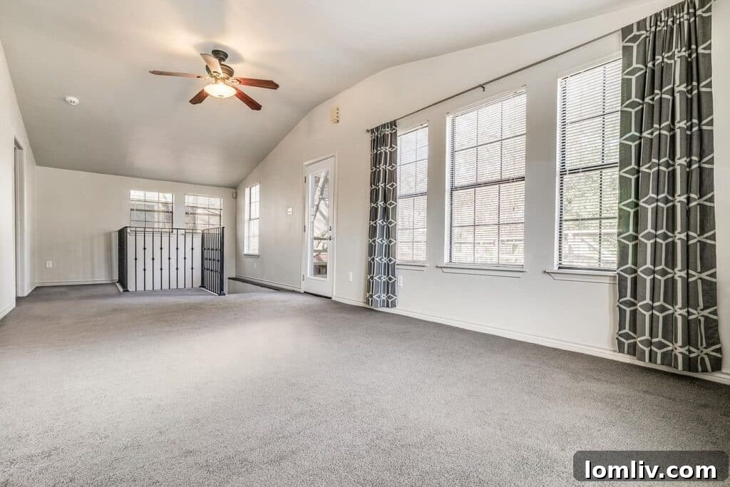 Spacious second-story deck overlooking the backyard at 5921 Vanderbilt Avenue