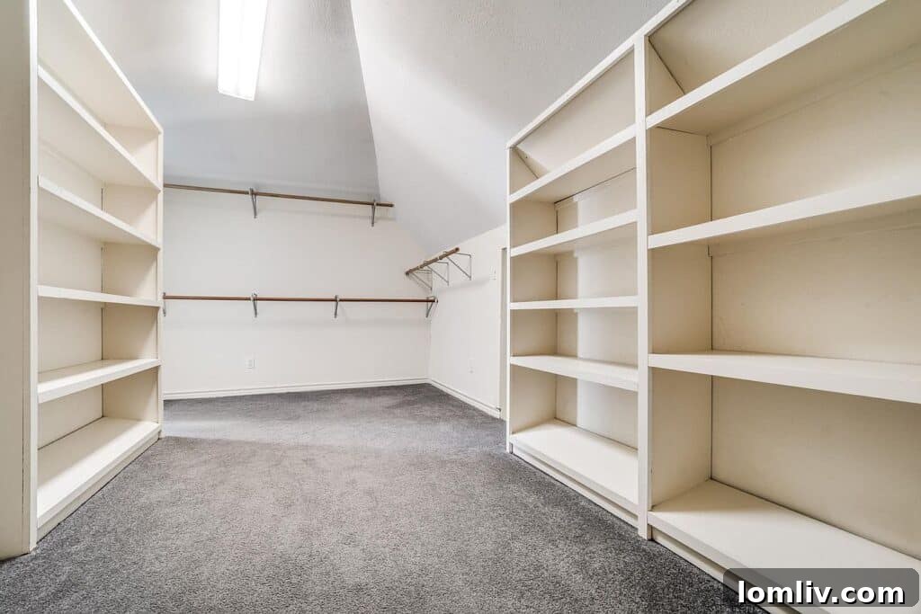 Massive walk-in closet in the primary suite of 5921 Vanderbilt Avenue