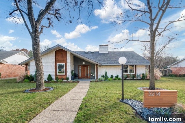 Darbyshire Home Exterior with A-Frame Accent