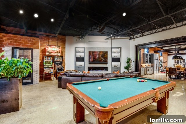 Urban Oasis: Industrial Luxury Retreat 16 Entertainment Area with Pool Table and Soundproofing
