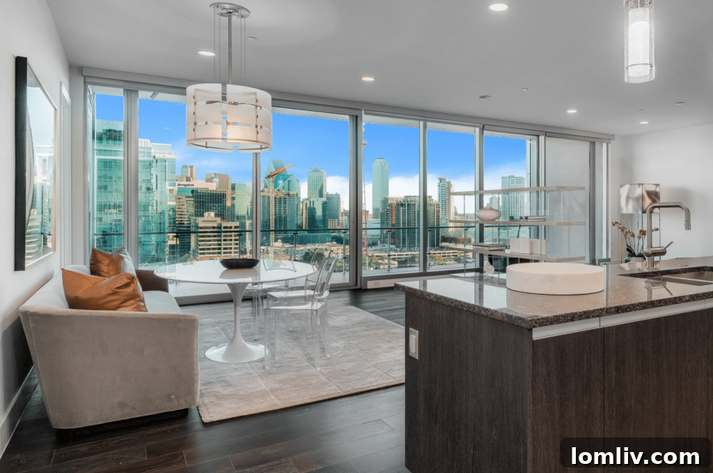 Your Invitation to Elegance Explore Two Bleu Ciel Model Showhomes 7 Cheryl Parsa selected a transparent dining table and chairs to maximize light flow and maintain an open feel.