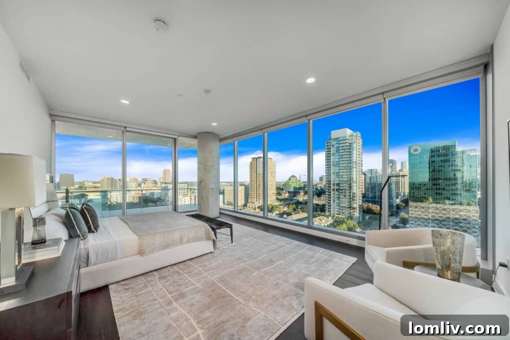 Your Invitation to Elegance Explore Two Bleu Ciel Model Showhomes 8 Walls of windows in a Bleu Ciel unit provide expansive city views, showcasing the vibrant Dallas skyline.