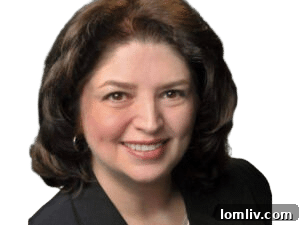 Renee McCurdy, a top agent at RE/MAX DFW Associates, known for record-breaking luxury home sales.